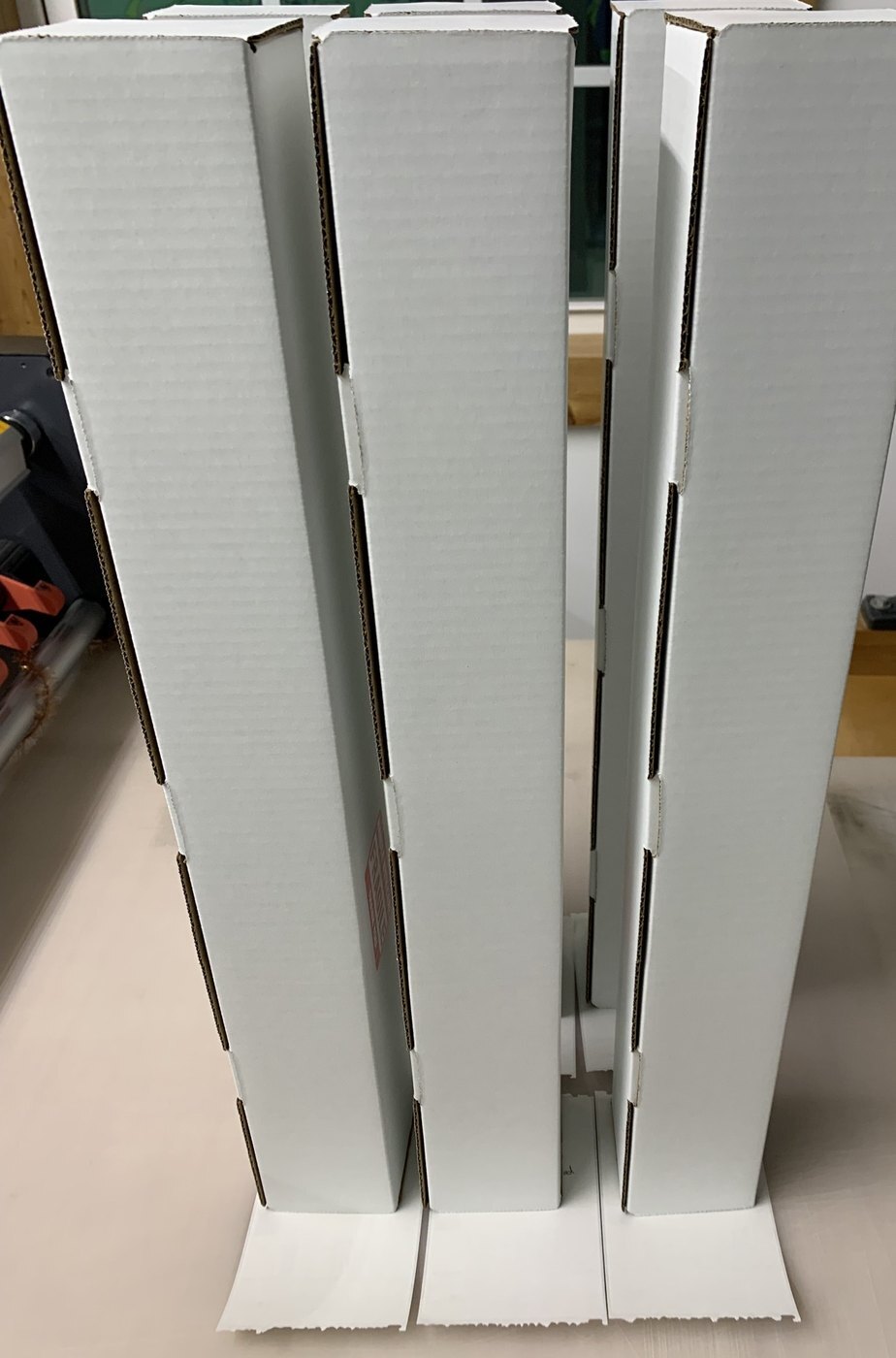 Cornhole wraps packed in protective shipping tubes